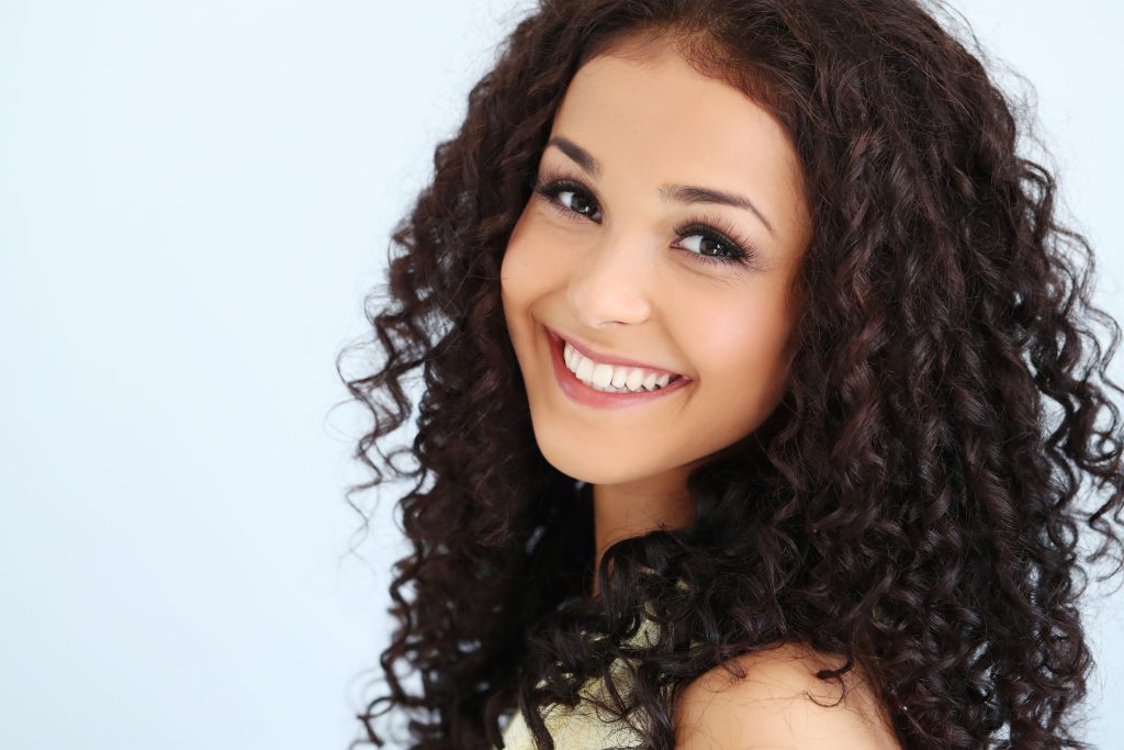 Lovely woman with curly hair